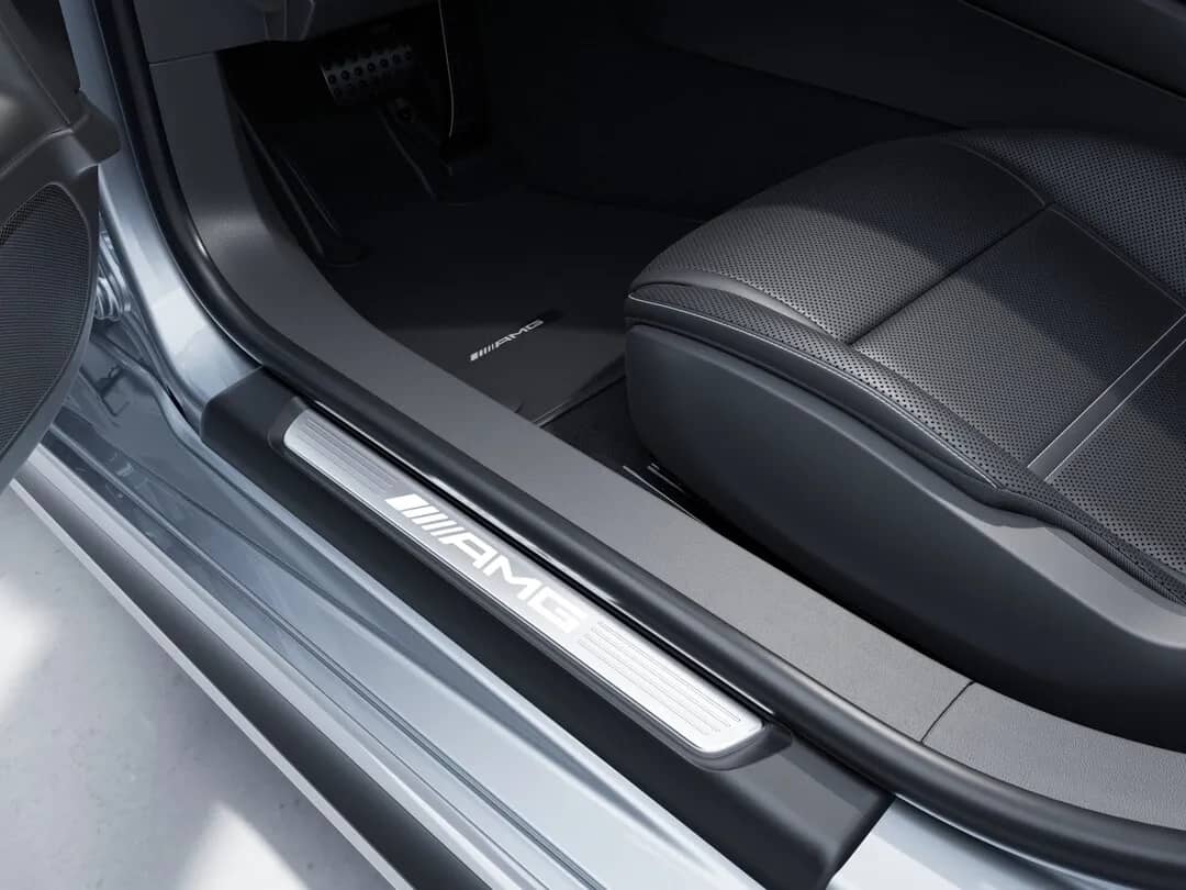 Door sill panels with "AMG" lettering and exchangeable covers