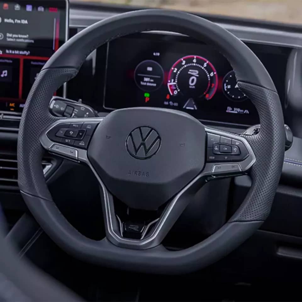 Leather-wrapped multi-function sports steering wheel